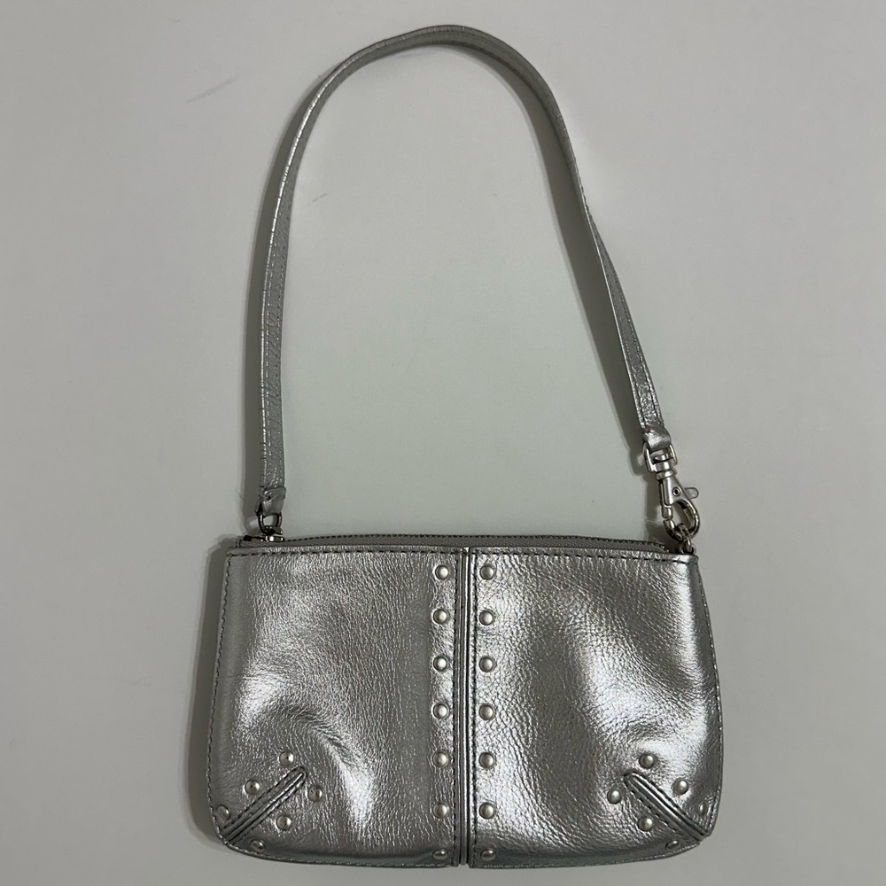 MICHAEL KORS SILVER WRISTLET.